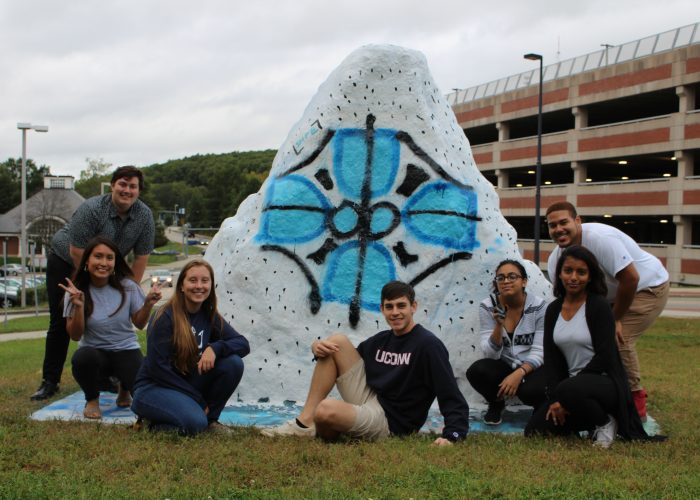 SHPE Familia Painting The Rock Back